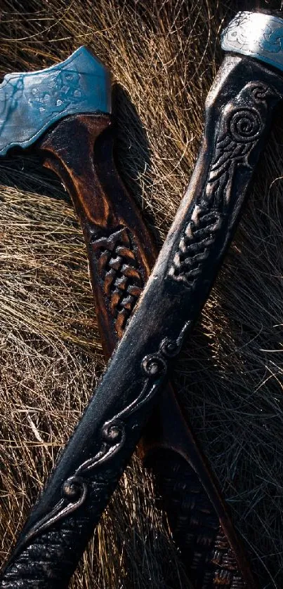 Intricately designed Viking axes on rustic background wallpaper.