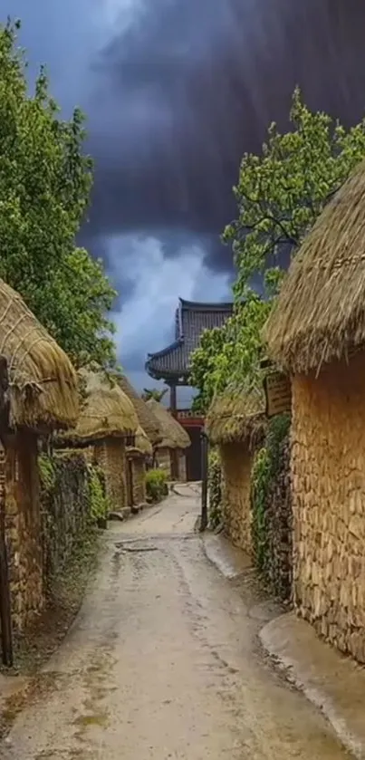 Ancient village path with rustic houses under a moody sky.