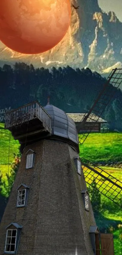 Windmill beneath an orange moon with lush green hills and mountains.