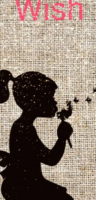 Silhouette of a girl making a wish on a burlap background.