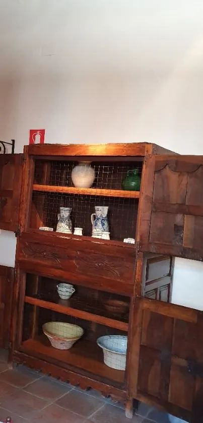 Rustic wooden cabinet with vintage decor in a cozy setting.