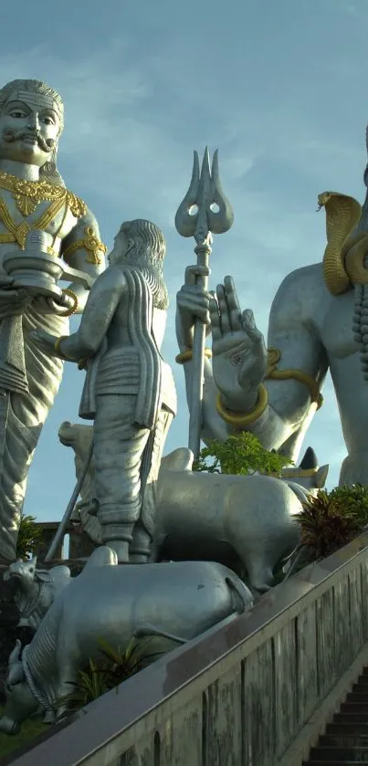 Majestic Indian statues with clear sky background.