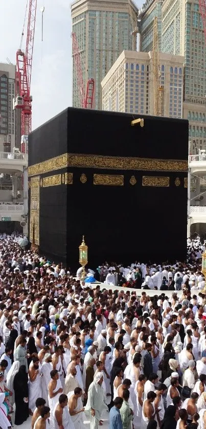 Pilgrims gathered around the Kaaba in Mecca, showcasing sacred architecture.