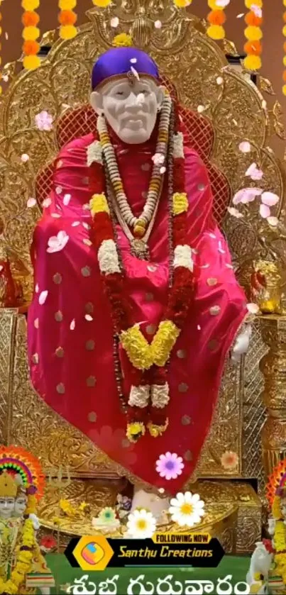 Sacred statue with vibrant attire and ornaments in a decorative setting