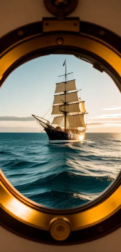 Sailing ship seen through a porthole at sea during sunset.