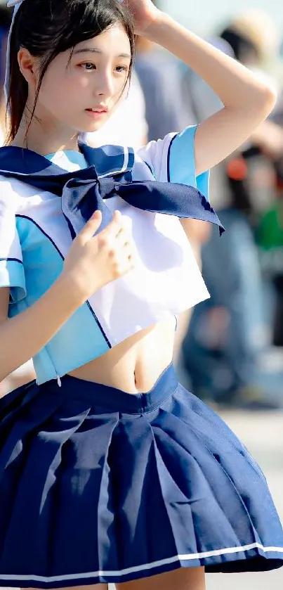 Anime sailor cosplay with blue outfit in urban setting.