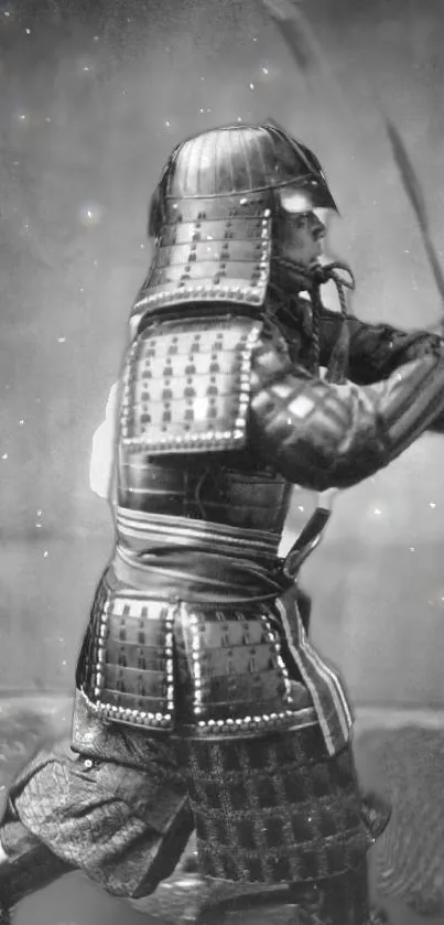 Black and white image of a samurai warrior in armor with sword drawn.