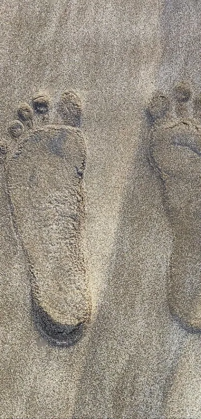 Footprints in sandy beach texture wallpaper.