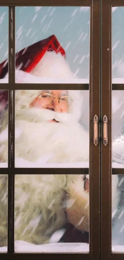 Santa Claus peering through a snowy window on a mobile wallpaper.