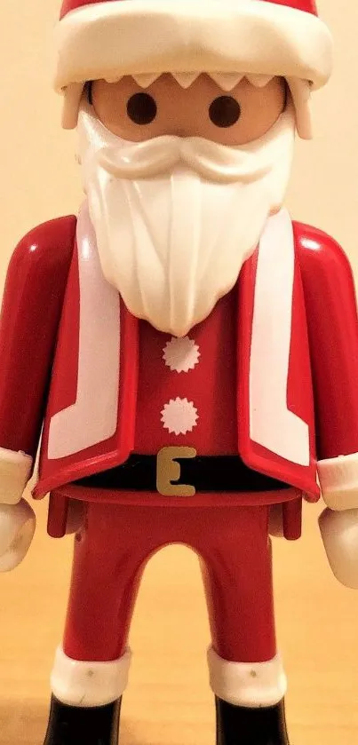 Red and white Playmobil Santa toy figure.