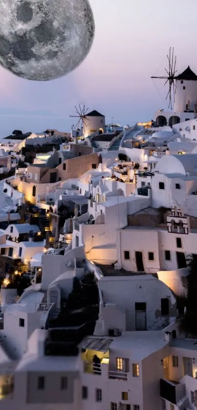 Santorini nightscape with full moon over white houses.