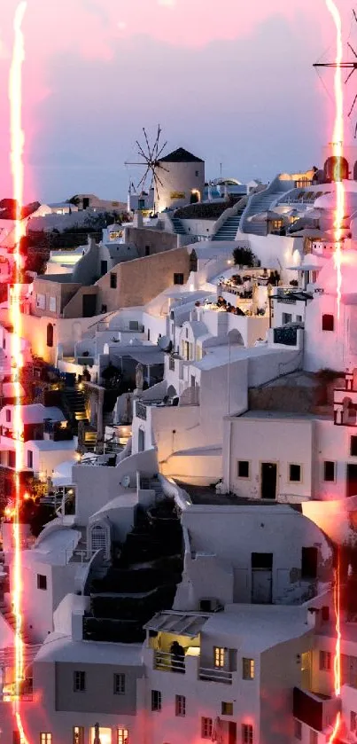 Santorini white buildings under a vibrant pink sunset glow.