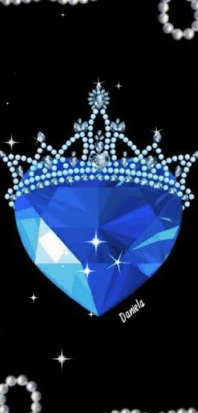 Royal blue heart with jeweled crown on black background mobile wallpaper.
