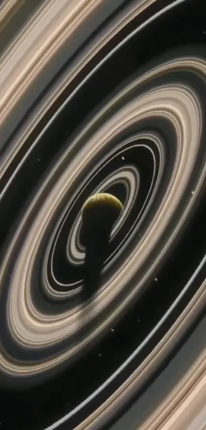 Saturn's rings and planet in space wallpaper with dark background.