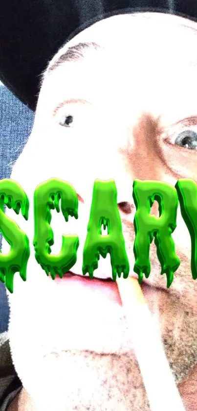 Surprised face with bold green SCARY text overlay on mobile wallpaper.