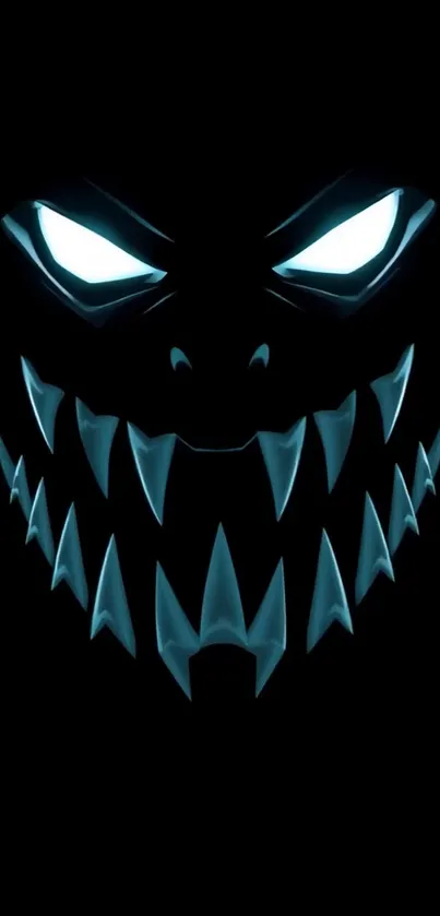 Glowing monster face with sharp teeth on black background.