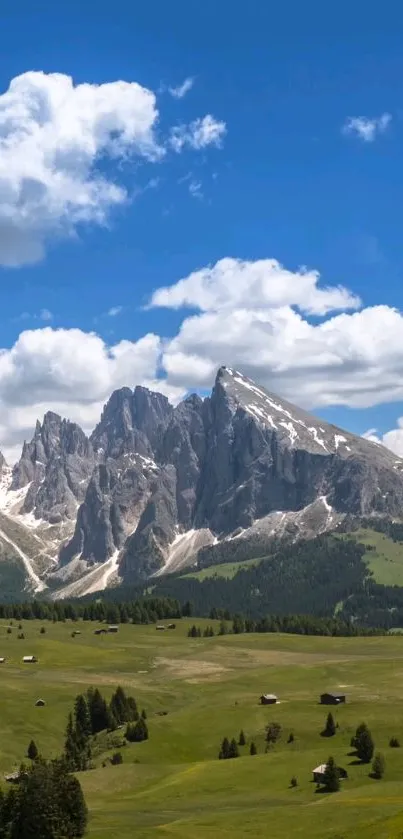 Scenic Alpine mountain wallpaper with blue sky and green valley.