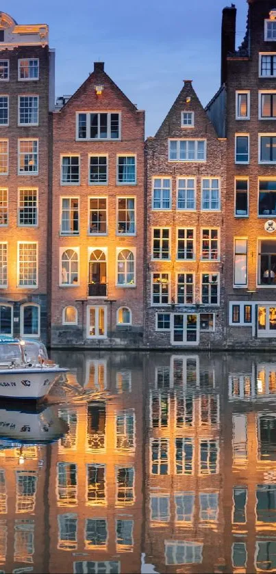 Scenic view of Amsterdam canal at dusk with glowing reflections.