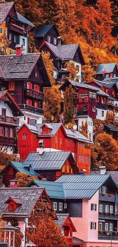 Charming autumn village with vibrant hues and colorful houses on a hillside.