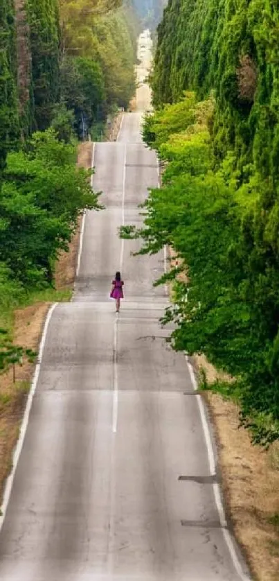 Path through lush green trees with a lone traveler, perfect as a mobile wallpaper.