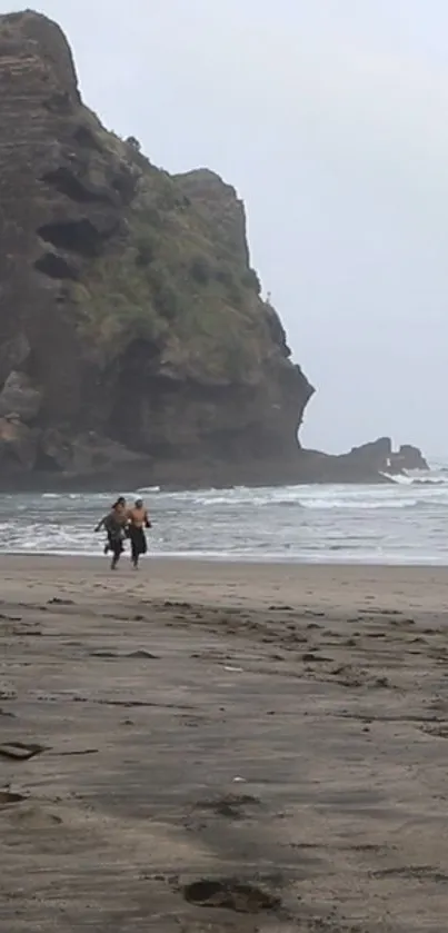 Serene beach with cliffs and ocean waves in the background.