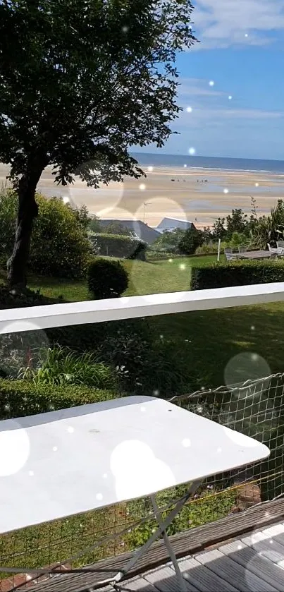 Scenic beach and garden view with blue sky.