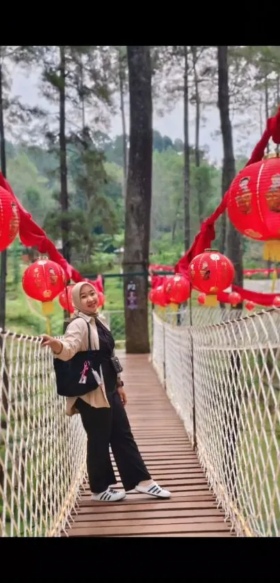 Woman on scenic bridge with red lanterns