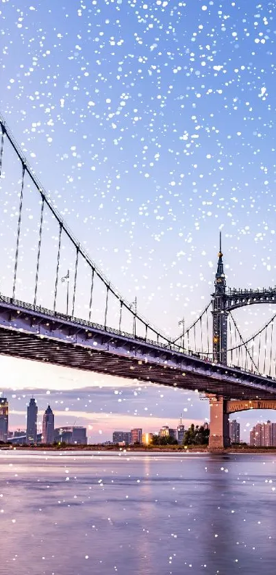 Snow-covered bridge with cityscape under a blue winter sky.