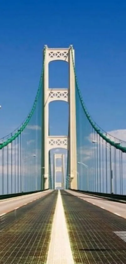 Suspension bridge against a clear blue sky.