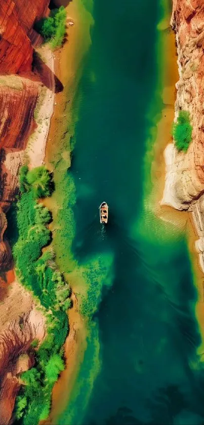 Aerial view of a teal river flowing through a vibrant canyon landscape.