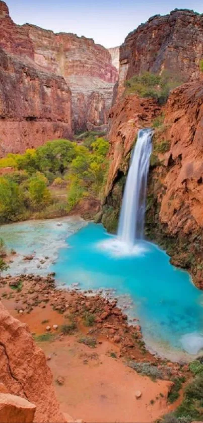 Beautiful turquoise canyon waterfall with scenic landscape.