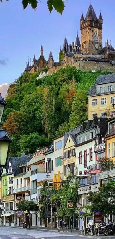 Mobile wallpaper of a scenic hillside castle with lush greenery.