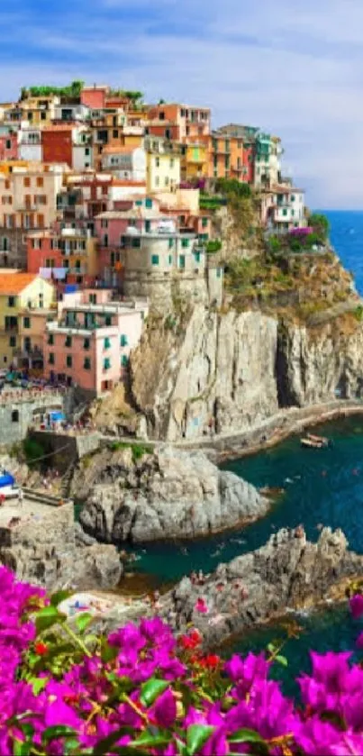 Vibrant coastal view of Cinque Terre with purple flowers and azure sea.