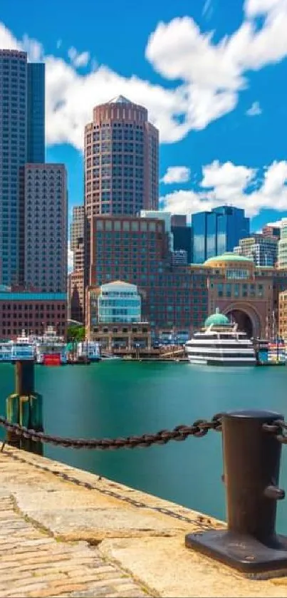 Scenic view of city skyline with skyscrapers by the waterfront under a vibrant blue sky.