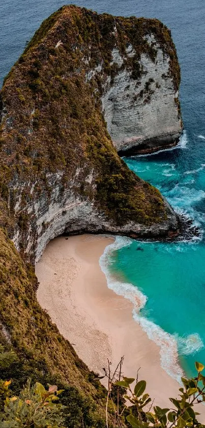 Scenic view of a beach with blue ocean and lush coastal cliffs.