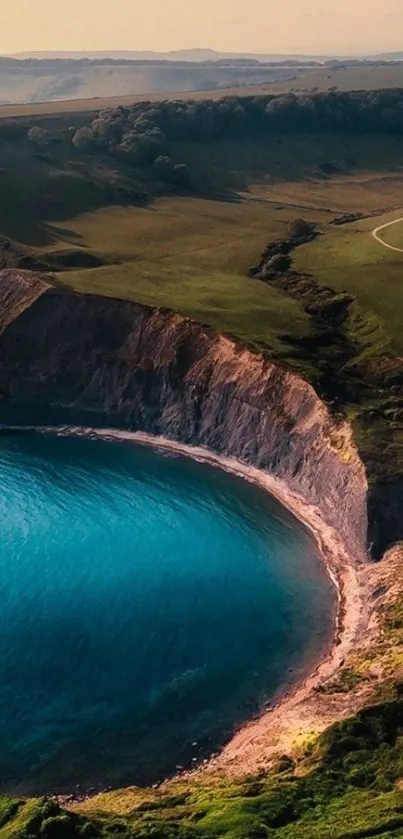 Scenic coastal landscape with lush green cliffs and vibrant blue ocean.