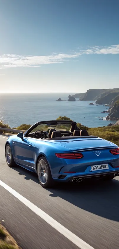 Blue convertible car on coastal drive with ocean view.