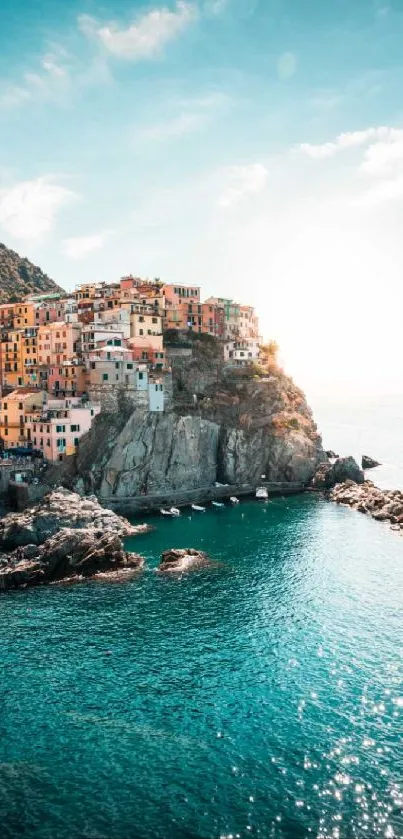 Scenic view of Italy's coastal village with bright turquoise sea.