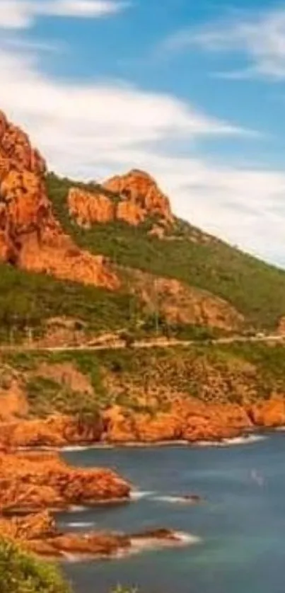 Scenic coastal view with red cliffs and blue waters under a vibrant sky.