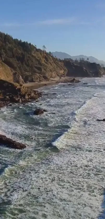 Scenic coastal view with ocean waves and rugged cliffs.