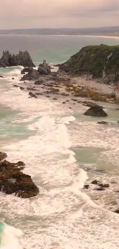 Majestic coastal scenery with waves and rocks along the shoreline.