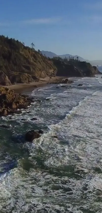 Scenic coastal view with ocean waves and cliffs, perfect for mobile wallpaper.