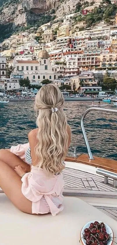 Woman relaxing on boat with a scenic coastal view.