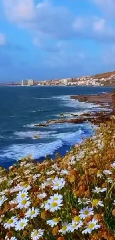 Scenic coastal view with flowers and ocean waves under a blue sky.