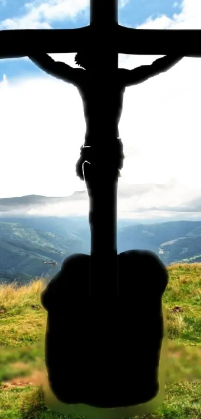 Scenic view of cross on mountain with blue sky.