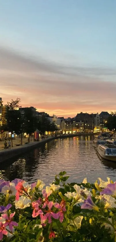 Evening canal view with vibrant flowers by a tranquil waterway.