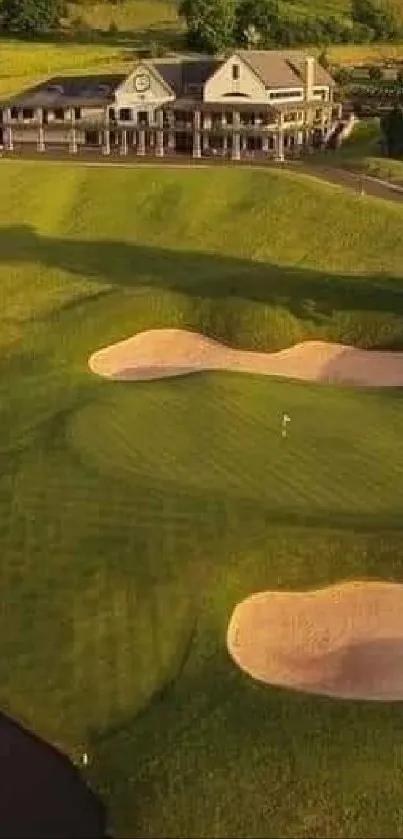 Serene aerial view of a lush golf course with water features and rolling hills.