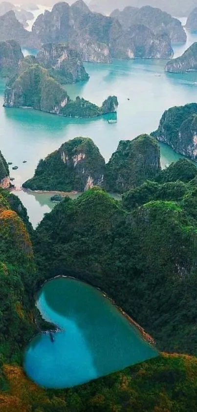 Aerial view of a scenic heart-shaped lake surrounded by lush green mountains.