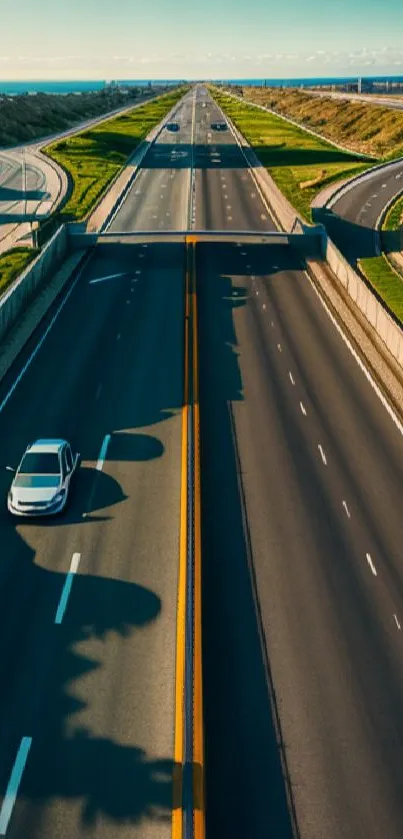 Serene scenic highway at sunset with vibrant green hues.