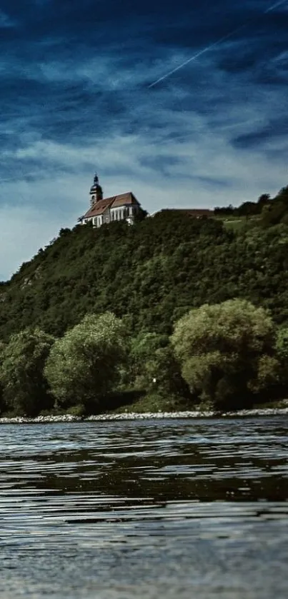 Scenic hilltop view with lush greenery and a river under a vibrant blue sky.